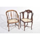 An Edwardian inlaid mahogany corner chair and a second similar chair The mahogany chair with a