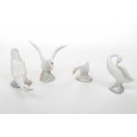 A collection of Lladro and Nao geese figures To include three Lladro examples and one Nao example