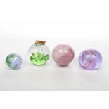 A collection of Scottish paperweights To include a Caithness apple form weight,