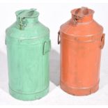 Two vintage painted metal milk churns Of typical cylindrical form rising to a domed top with