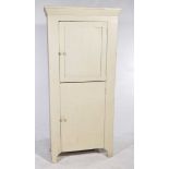 A rustic painted hardwood two door cabinet The two doors with knob handles enclosing a vacant