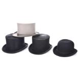 A collection of vintage gentleman's top hats and bowler hats To include a Christie's of London