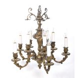 A French Rococo style five branch chandelier The central bulbous knot extending to a flared upper