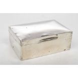 A Silver George V Silver cigarette box Of rectangular form with hinged cover,