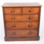 A Victorian mahogany chest of drawers With a rectangular thumb moulded top above two short and