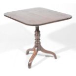 A 19th Century mahogany tilt top table The rectangular crossbanded top with rounded corners