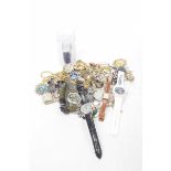 A collection of costume jewellery and watches To include; brooches,