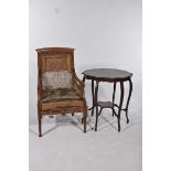 An Edwardian inlaid mahogany armchair and a Victorian two-tier table The armchair with inlaid