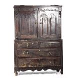 An impressive 19th Century stained pine French housekeepers cupboard With a moulded cornice above a