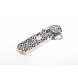 A Victorian silver spectacles case The pierced scrollwork case with monogrammed 'ER' cartouche and