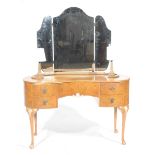 A Queen Anne style burr walnut dressing table,