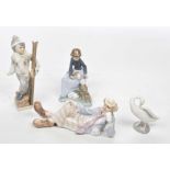 A collection of Lladro, Nao and further Spanish figures To include a Lladro goose,