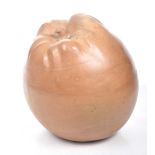 A decorative large oversized terracotta model of an apple Of typical form with all over good glazed