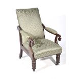 A William IV mahogany and upholstered arm chair The folding sprung back and seat supported on a