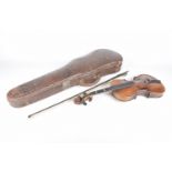 A late 19th/early 20th Century violin in crocodile skin case Complete with bow, 80cm long.