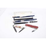 A mixed group of collectable pens and pen knives To include a 14ct gold nibbed Parker pen,