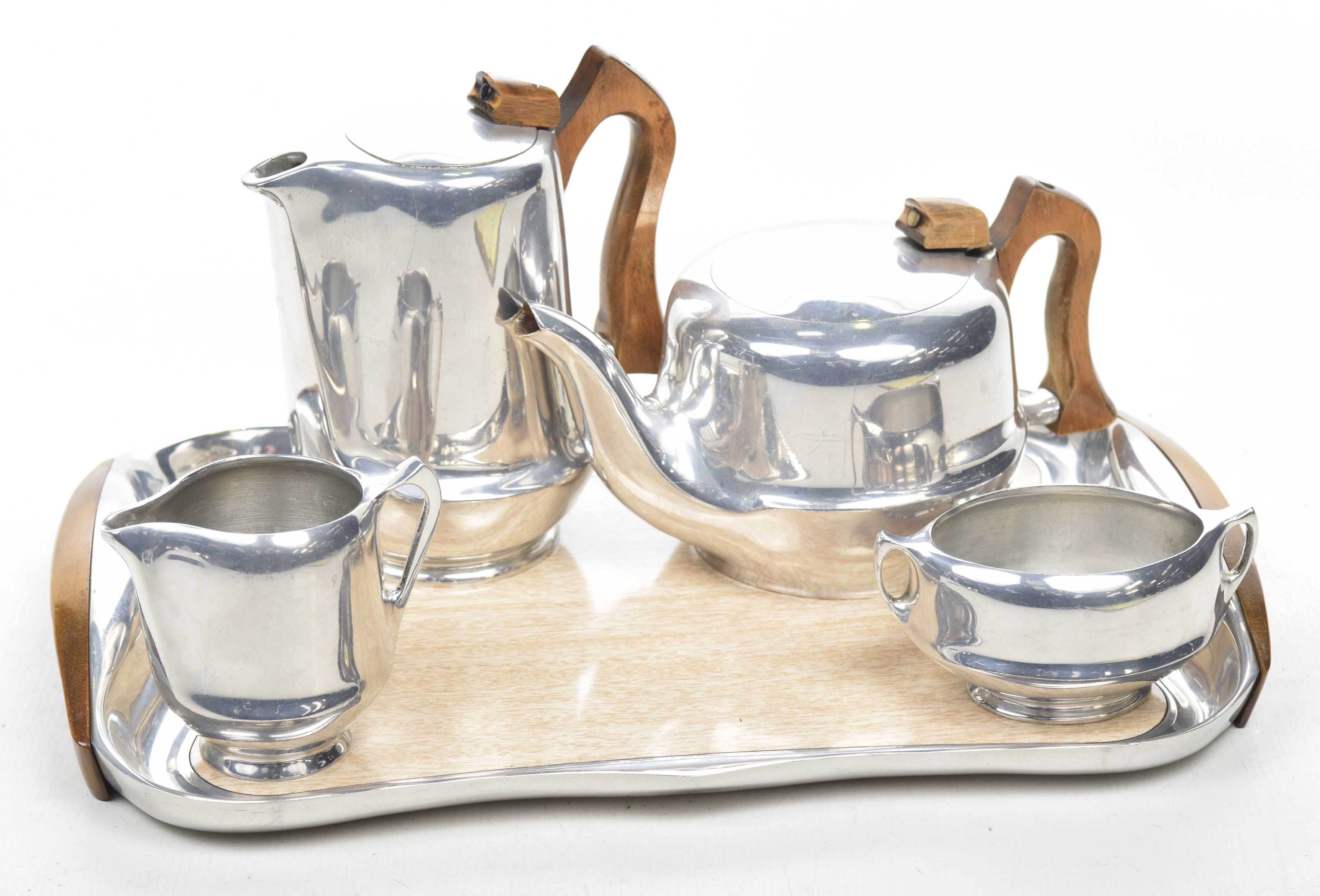 A vintage 1960's Picquot ware four piece tea and coffee service The chromed teapot, coffee pot,