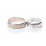 A 9k white gold diamond set band Together with, a silver band, inscribed, weight of gold approx. 3.
