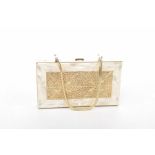 A ladie's mother of pearl compact handbag Of rectangular form openng to reveal powder and lipstick