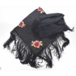 An Edwardian embroidered ladies shawl The black silk shawl with embroidered pink,