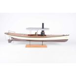 A wooden model steamboat The wooden painted hull delicately detailed with further painted wooden
