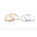 A precious yellow metal band Concave shape with chased detail, together with,