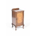 A mid 20th Century walnut pot cupboard The well figured veneered door enclosing a single shelf,