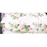 A pair of interlined floral curtains 210cm drop x 230cm wide decorated with fuchsias and rose