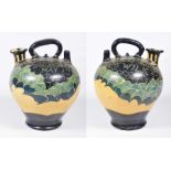 A painted pottery jug, possibly South American Of rounded form with twin spouts and handles,