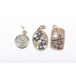 A 9k gold gem-set floral pendant Together with, two other pendants,