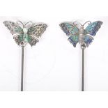Two Edwardian Charles Horner butterfly hatpins Each enamelled with green and blue with butterfly