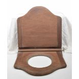 A late 19th Century/early 20th Century wooden lavatory seat Of typical arched square form with