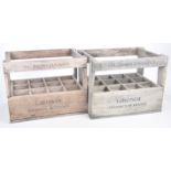 A pair of vintage wine crates Each of the rectangular form crates with twelve bottle sections,