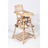 A Victorian child's beechwood metamorphic highchair Of typical form,