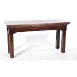 A Victorian mahogany Gothic influence side or console table The rectangular moulded top above a