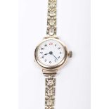 A ladies 9k gold manual wind wrist watch To a 9k gold bracelet, gross weight approx.