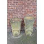 A pair of reconstituted stone planters Each of tapered cylindrical form,