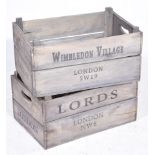 Two vintage apple crates Each of typical panelled form with twin handles and stencil to the