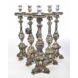 A collection of six similar Spanish style giltwood pricket candlesticks Each of ecclasiatical form