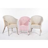 A pair of Lloyd loom tub chairs Each chair of painted woven construction raised on bent wood