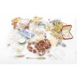 A large collection of costume jewellery To include; beads,