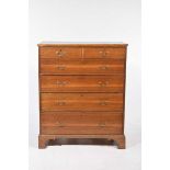 A late 19th Century oak chest of drawers With an arrangement of two short and four long graduated