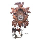 A mid 20th Century German Black Forest style August Schwer cuckoo clock The architectural casing