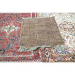 A collection of Teheran and Tabriz style carpets To include a red ground example detailed with pink,