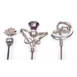 A collection of three Edwardian Charles Horner Silver hat pins Each of stylised scrolling abstract