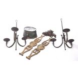 A pair of 16th Century style Spanish iron work pricket hanging candelabrum Each of the three scroll