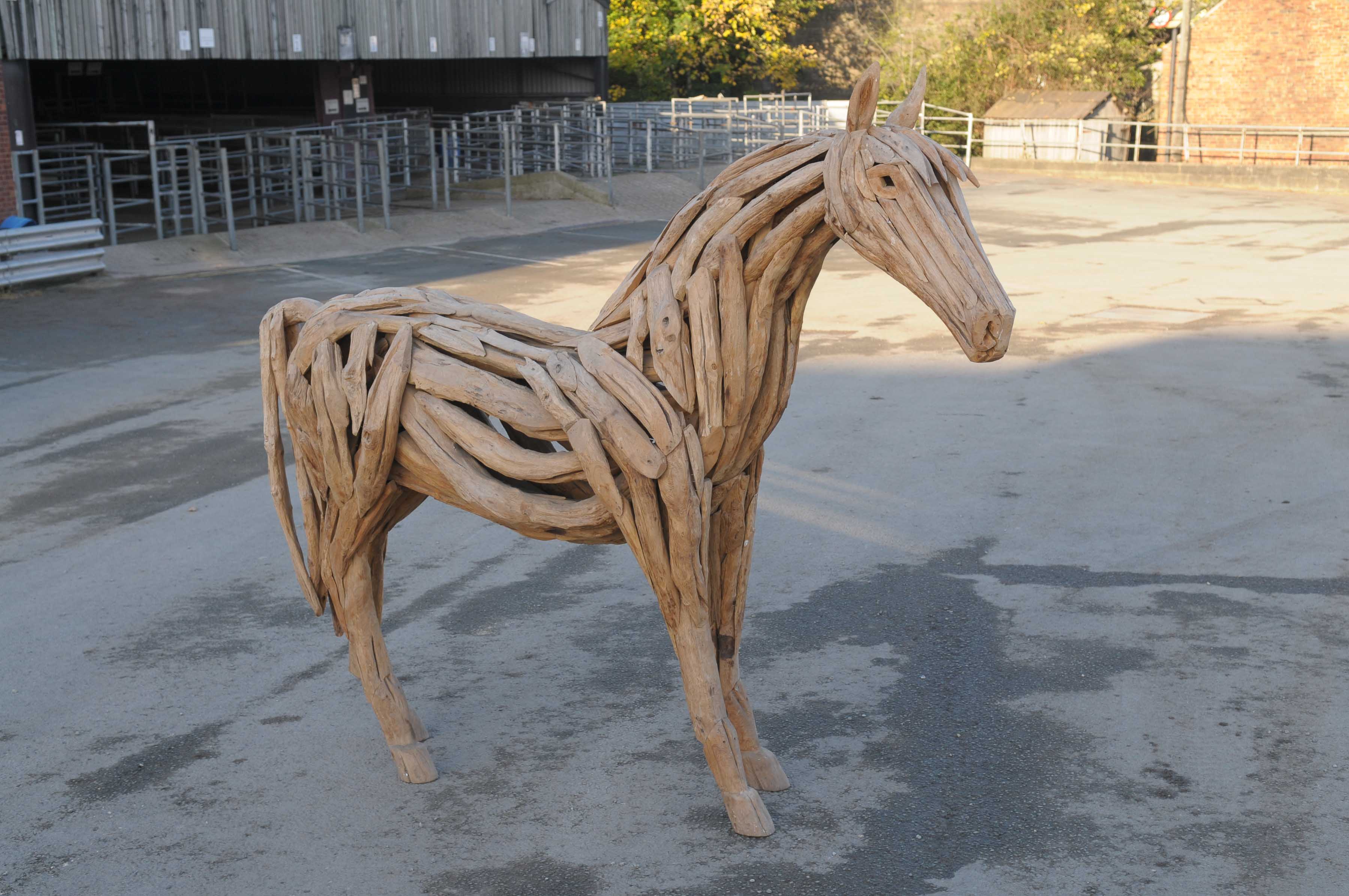 A decorative drift wood figure a horse Beautifully comprising various pieces of driftwood formed