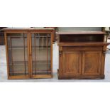 A Victorian mahogany library bookcase With a moulded cornice above a pair of glazed doors enclosing