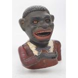 A Blackmoor cast metal and painted money box Cast has a jovial male figure,