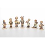 A collection of Hummel Goebel figures To include seven examples of varying size depicting children